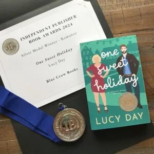 IPPY medalist Lucy Day's certificate, book, and medal