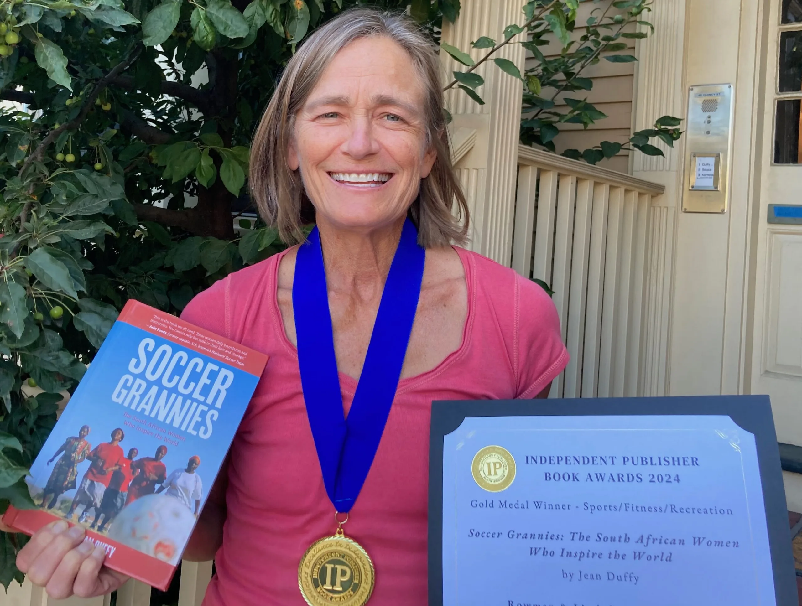 Jean with her IPPY award and medal